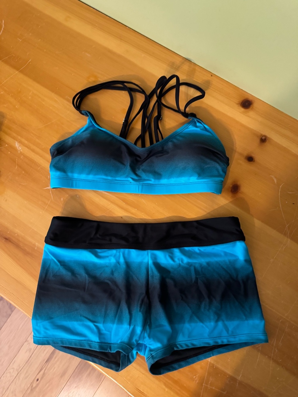 Black Swim Top with Tag and Medium Size
NOTE - missing the black tank cover up